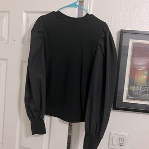 Black shirt with puffy shoulders